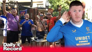 Rangers fans sing John Lundstram chant as busker joins in