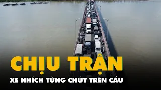 Hàng ngàn ô tô và xe máy nhích từng chút trên cầu Rạch Miễu, chịu trận dưới trời nắng gắt