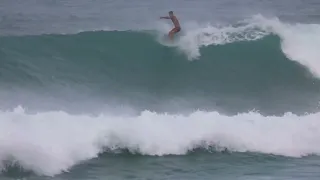 Big sunset on single fin longboard