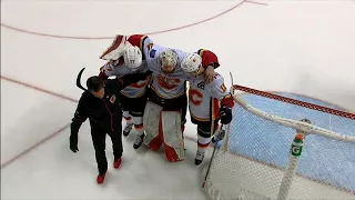 Mike Smith has to be helped off the ice after apparent groin injury