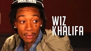 Wiz Khalifa shows off new tattoos & talks Snoop's support at Summer Jam