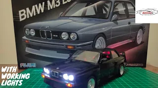 Build BMW M3 E30 Sport Evolution Extended Duration with working lights. Fujimi Modelkit 1:24.