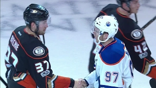 Handshakes: Ducks and Oilers shake hands after a tense Game 7