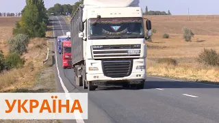 На Николаевщине многотонные зерновозы разбили отремонтированную трассу на Днепр