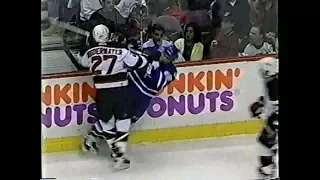 Scott Niedermayer crosschecks Tie Domi