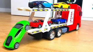 Bigger diecast model cars being carried by transportation vehicles