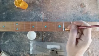 Installing frets on a CBG