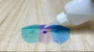 Super Glue + rainbow baking soda ! Pour the glue into different colors of baking soda.