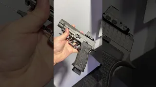 A new compensated Sig P320 AXG Legion.
