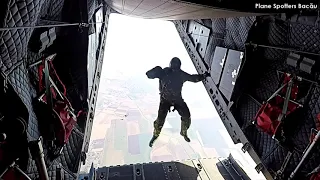 Romanian Paratroopers jumping from Hercules and Spartan.