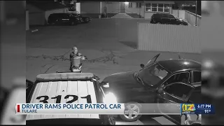 Surveillance video shows a driver ram into a Tulare Police patrol car