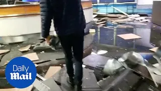 TV staff walk through ruined newsroom after Alaska earthquake