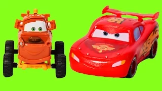 Lightning McQueen red racing car, Giant slide & trucks | toys Disney Cars 2 + Lightning McQueen