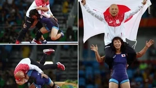 Japanese wrestler celebrates Olympic gold medal by slamming her COACH onto the ground