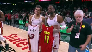 Trae Young & Dwyane Wade exchange jerseys postgame.