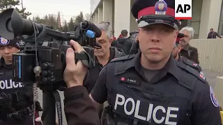 Father of Toronto suspect leaves court, after son's appearance