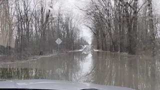 Driving Through Flooded Road