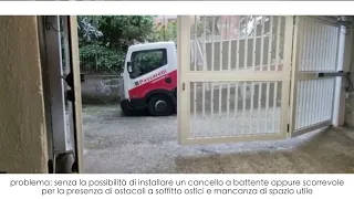 Cancello automatico con impacchettamento a libro in un condominio