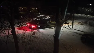 tow truck taking my neighbor's car away because it broke down