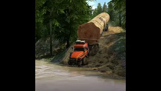 trucks loaded with large logs crossed the river