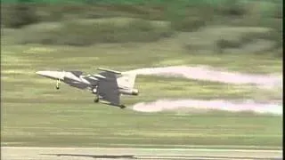 Saab JAS-39 Grypen low pass with smoke and landing gear down