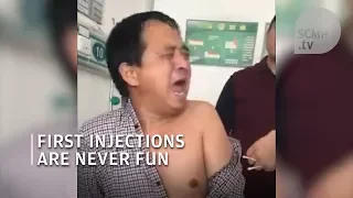 Chinese man scared of his first ever injection
