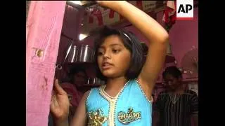 Slumdog child actors return to normality and everyday chores
