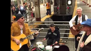 U2 Performs Surprise Concert At NYC Subway Station