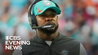 Former Dolphins coach sues NFL for alleged racial bias