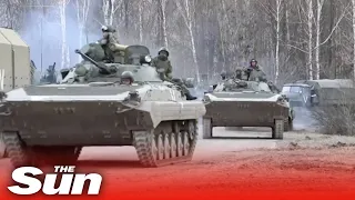 Russian tanks, troops and military vehicles move in on Kyiv region