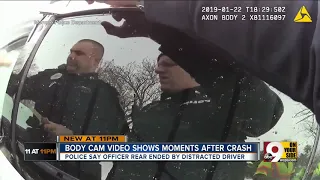 Body camera video shows moments after truck hit police car