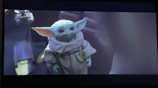 Baby Yoda follows Mando off ship