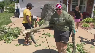 Family members pitch in to clean up tornado damage in south St. Louis County