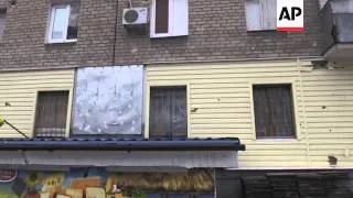 Heavy shelling around the eastern Ukrainian city of Donetsk overnight on Sunday killed two people, a