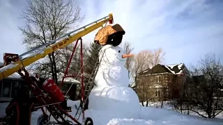 See How This Canadian Family Builds Their 20-Foot-Tall Snowman