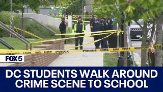 DC STUDENTS WALK AROUND CRIME SCENE TO SCHOOL