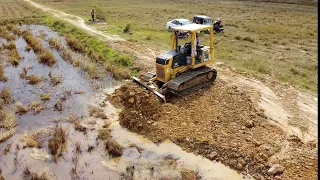 First Starting A New Project Filling stone By Bulldozer Komatsu D31PX push stone inthe  Field