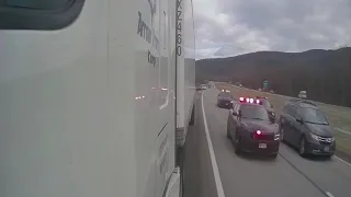 Truck driver helps Police in a car chase on the highway