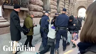 Greta Thunberg dragged by police from climate protest outside Swedish parliament