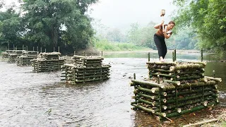 Building a bamboo bridge to the island off grid - Making 6 stone and bamboo bridge piers