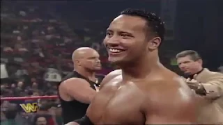 Stone Cold Steve Austin relinquish The Intercontinental Championship Belt to The Rock