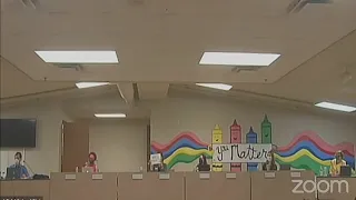 Board member holds up controversial sign during west Valley school board meeting