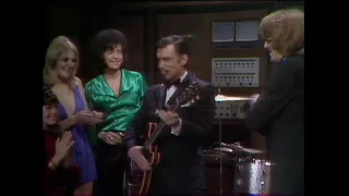 Ritchie Blackmore  talking to Hugh Hefner at the Playboy Mansion