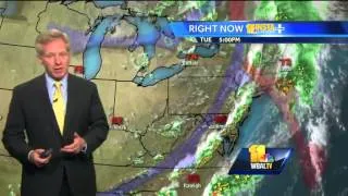 Breezy, possible afternoon shower Wednesday