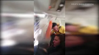 SCARY VIDEO: Flight attendant, beverage cart smash into ceiling during violent turbulence | ABC7