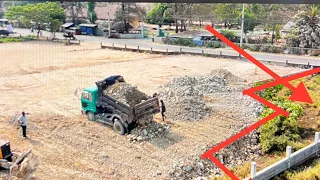 The Best Land Filling Small Plot by Operator Bulldozer Push Soil with Dump Truck Unloading Soil