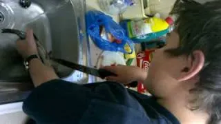 Ewan Cleaning a Fish