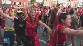 Belgian football fans celebrate dramatic win over Japan
