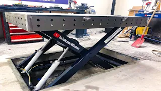 Hydraulic welding table.