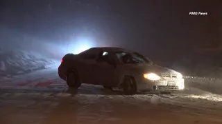 Cars spin out and become stuck after snow storm near Lake Arrowhead, California.